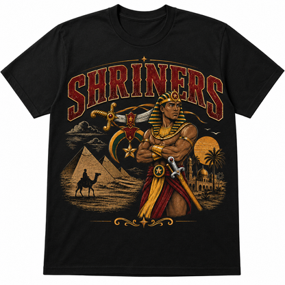Shriners Egyptian Heritage black T-shirt with large red SHRINERS lettering, Egyptian warrior, sword, crescent, star, pyramids, and desert artwork