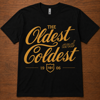 Alpha Phi Alpha Oldest and Coldest black T-shirt with gold script, ΑΦΑ shield, and 1906 details