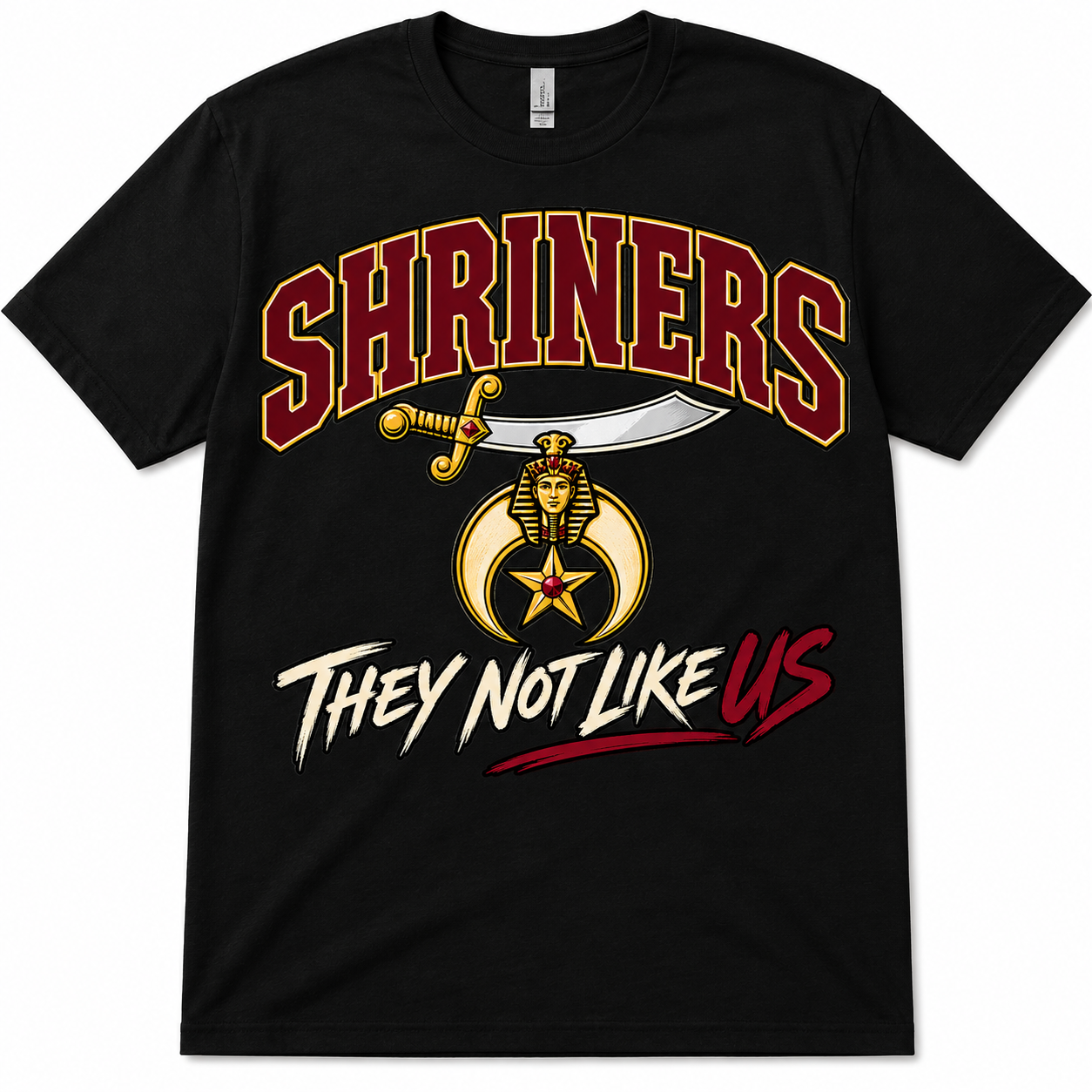 Shriners They Not Like Us black T-shirt with burgundy and gold SHRINERS lettering, scimitar, crescent and star emblem, and cream tagline