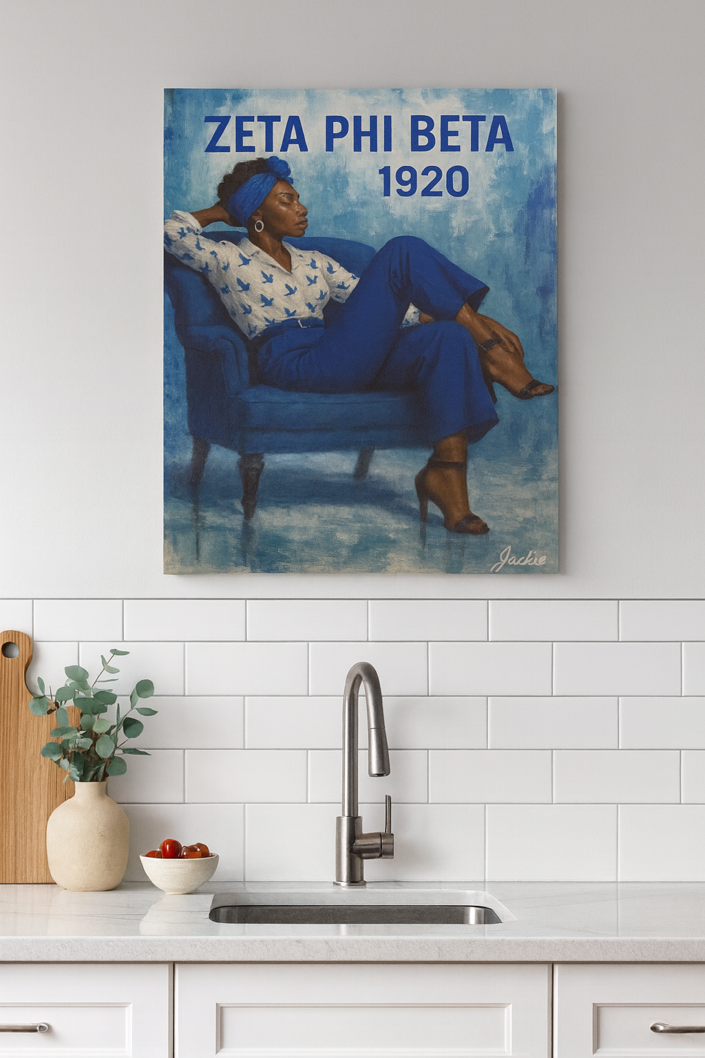Zeta Phi Beta 1920 poster on a wall above a kitchen sink.