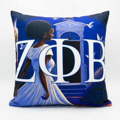 Decorative pillow with a woman's silhouette, architectural elements, and 'Zeta Phi Beta' letters on a blue background.