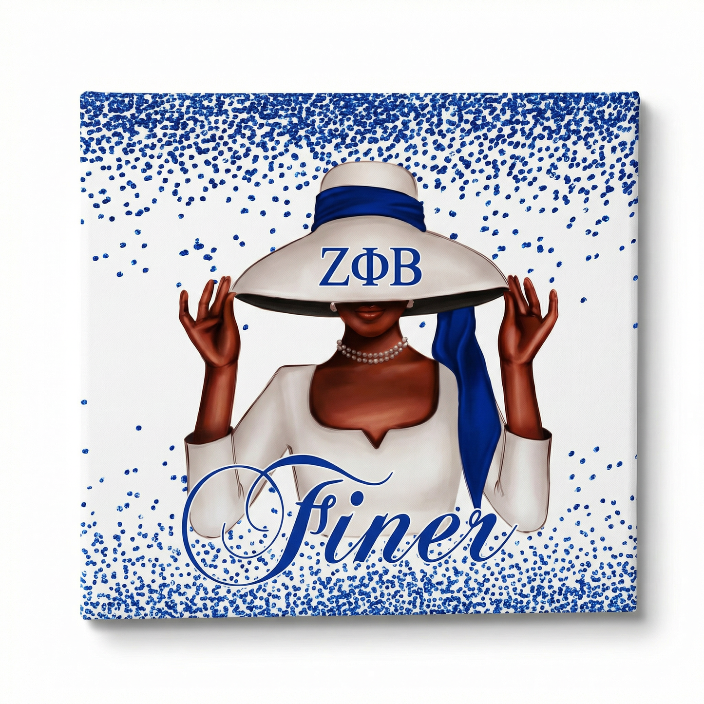 Canvas print with a woman wearing a sun hat with 'Zeta Phi Beta' letters, on a blue and white polka dot background.