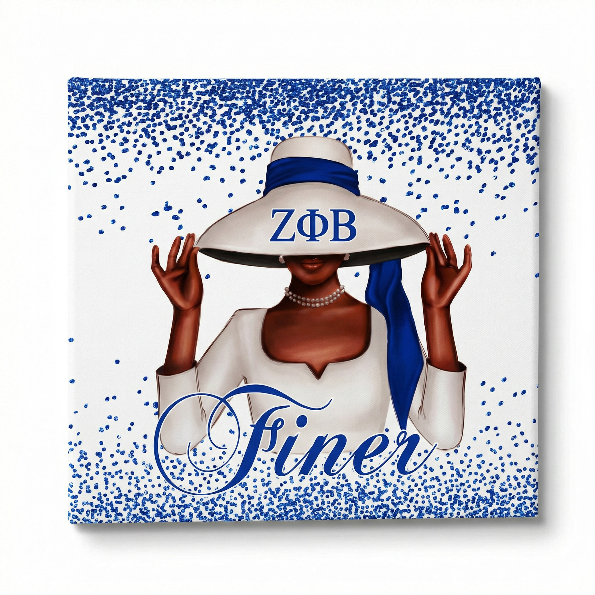 Canvas print with a woman wearing a sun hat with 'Zeta Phi Beta' letters, on a blue and white polka dot background.