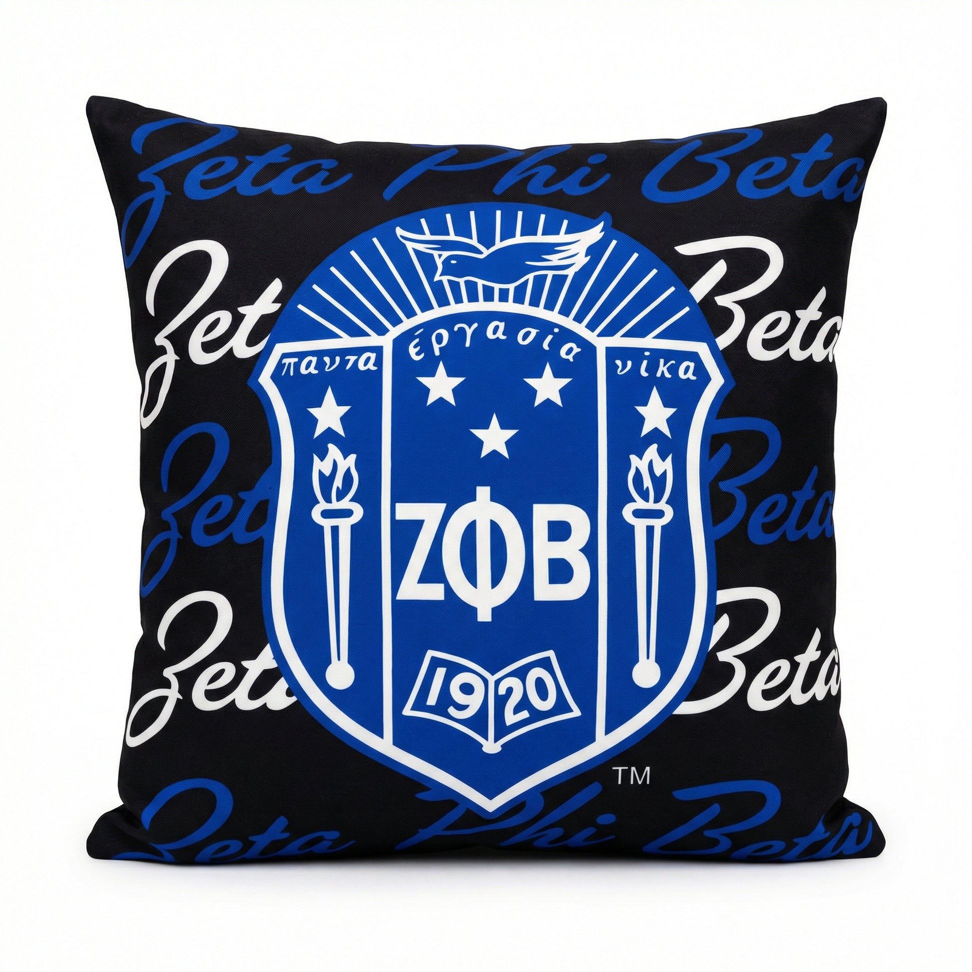 Decorative pillow with Zeta Phi Beta logo and text on a black background
