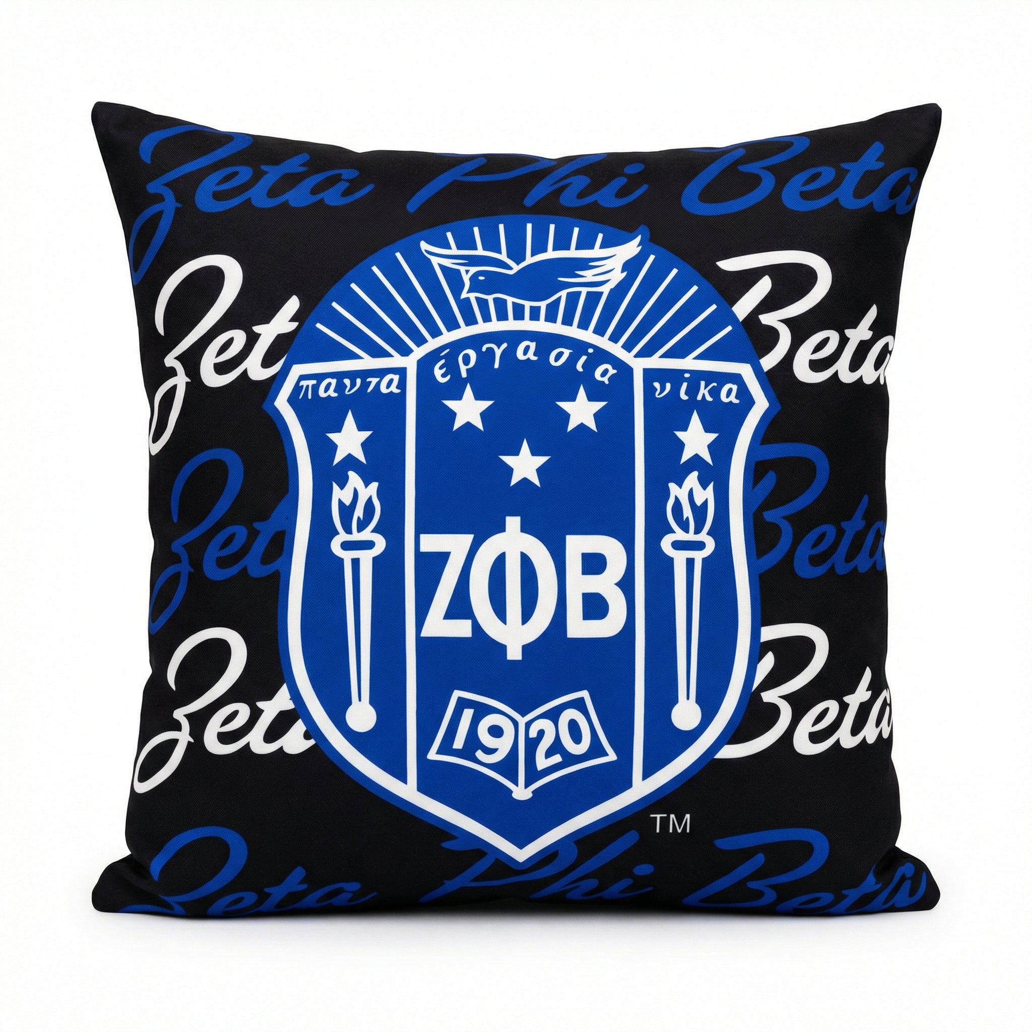 Decorative pillow with Zeta Phi Beta logo and text on a black background