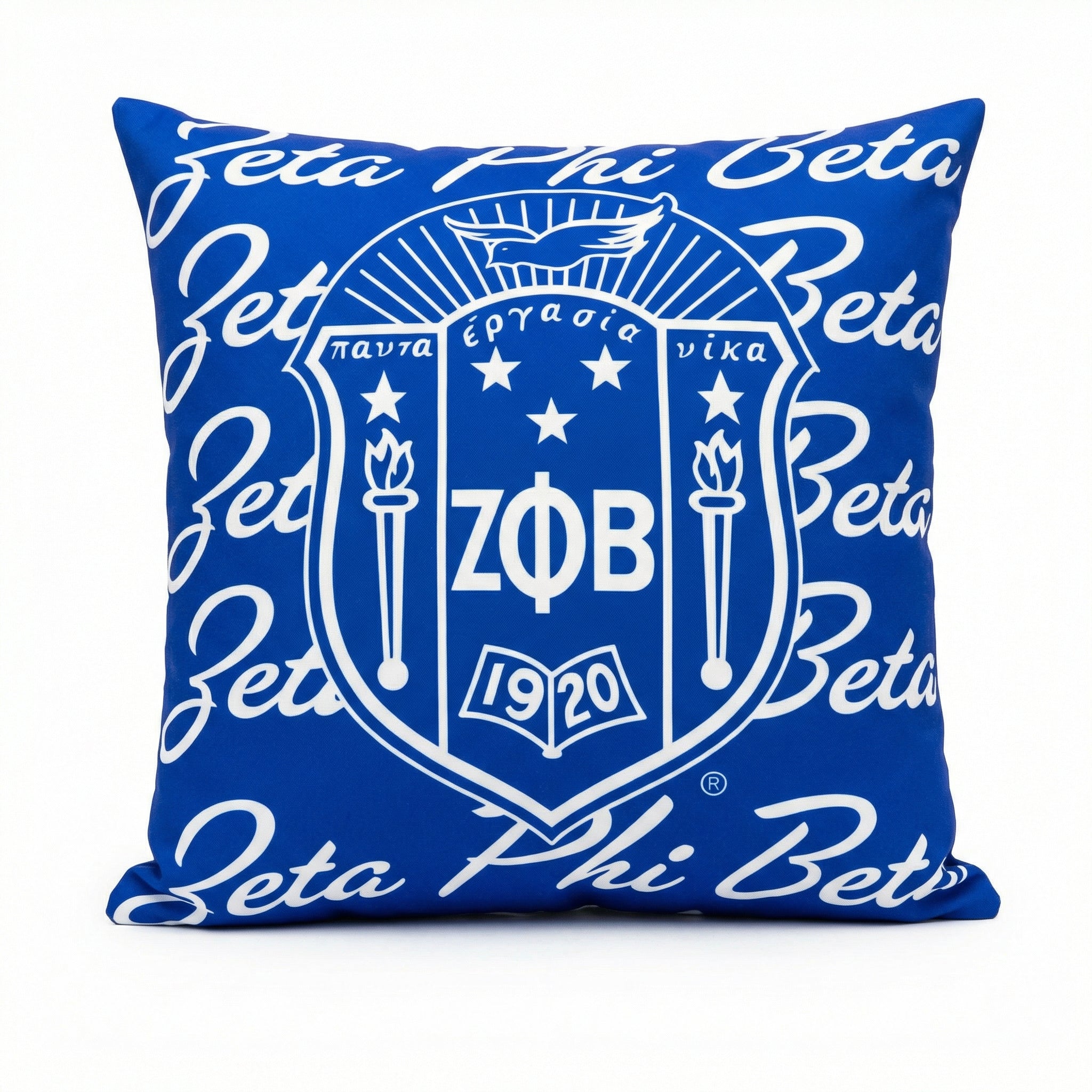 Blue pillow with Zeta Phi Beta logo and text on a white background