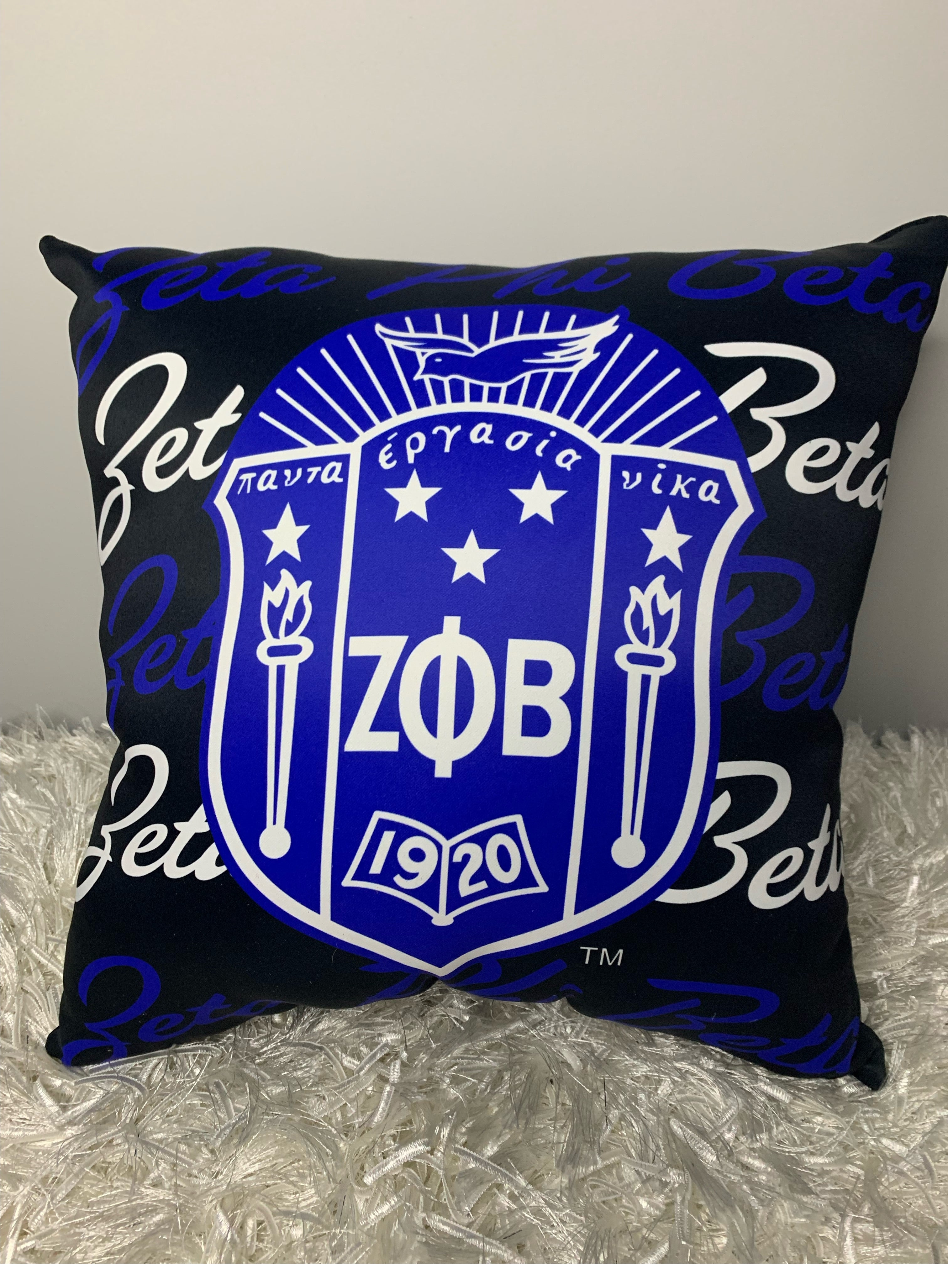 A square pillow with a blue background featuring the Zeta Phi Beta fraternity logo and the text 'Zeta Phi Beta 1920'.